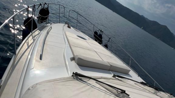 The spacious sunbathing area on the deck of motor yacht Sky 22 offers comfort and enjoyment.