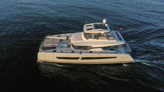 The Fountaine Pajot Ariva cruises off Corfu with spacious decks and sleek, modern exterior design.