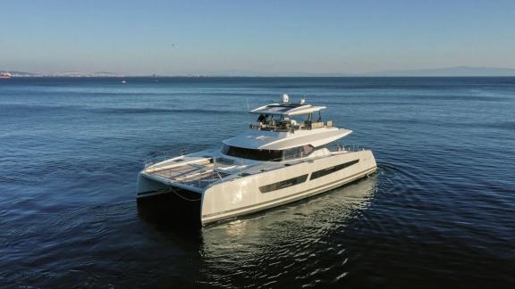 The Fountaine Pajot Power 67 Ariva floats near Corfu with sleek lines and expansive deck space.