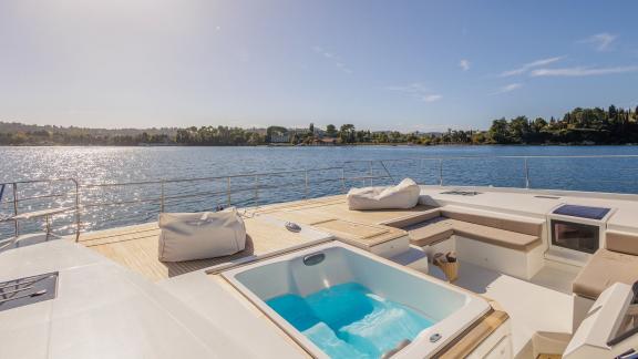 Anchored off Corfu, the Ariva Power 67 offers a jacuzzi, sunbeds and scenic lounging on the spacious bow.