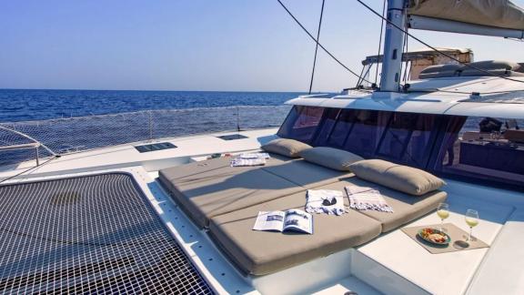 Helidoni Fountaine Pajot catamaran features a relaxing foredeck with snacks and drinks.