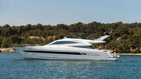 The sleek Le Chiffre motor yacht is seen cruising along the scenic coastline of Šibenik, Croatia.