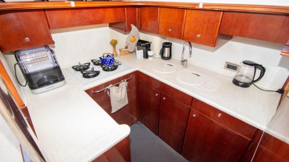 The modern kitchen of motor yacht NateWhite is fully equipped and stylishly designed.