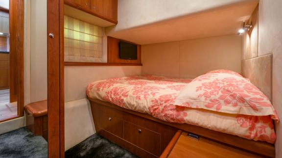 Comfortable and cozy bedroom of the Glorious motor yacht.