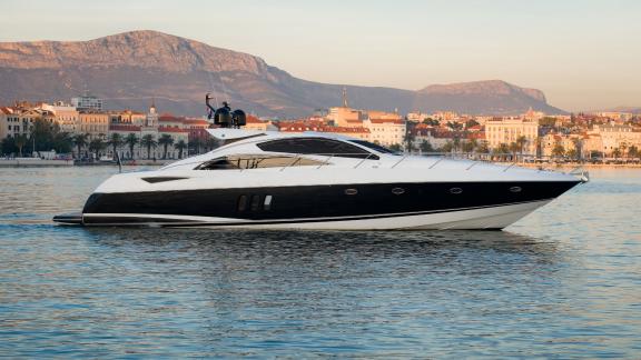 The Glorious motor yacht is shown slowly gliding along the coast of Croatia.