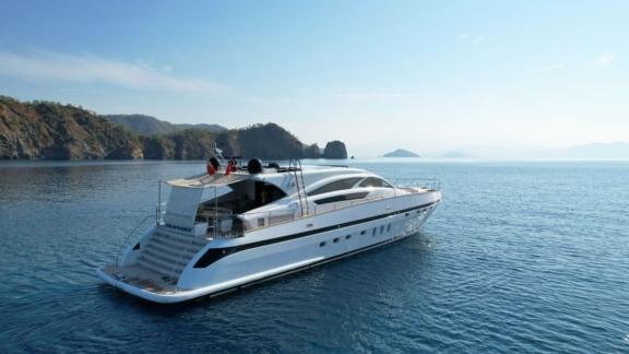 Magnificent motor yacht in the calm waters off the coast of Greece.