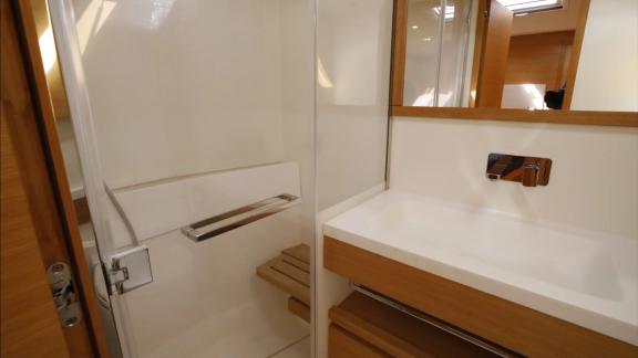 Bathroom with shower on the Grand Soleil 58 Morfely sailing yacht in Sardinia, Italy. Adding comfort to life on board.