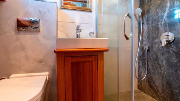 Elegant bathroom of the luxurious Gulet Bodrum Queen in Bodrum, Turkey, with shower.