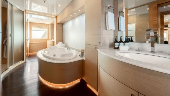 Enjoy relaxation and comfort in the luxurious bathroom of your yacht.