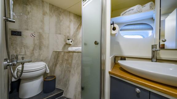 Stylish bathroom with shower and toilet on Gulet Golden Glory.