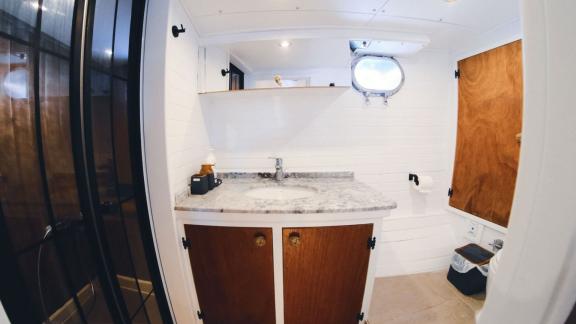 Bright bathroom with marble washbasin