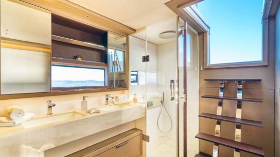 Elegant and modern bathroom with sea view on the Amada Mia yacht, perfect for relaxation.