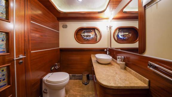 A wood-panelled guest toilet, Gulet La Bella Vita in Bodrum