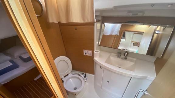 The bathroom of the sailing yacht Winter Breeze offers comfort with modern amenities.