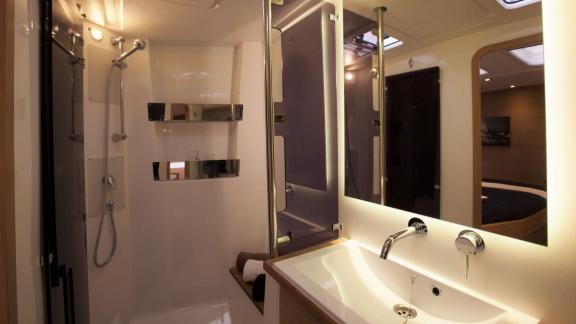 Modern bathroom on Motor Yacht Summer Fun with elegant shower and high-quality fixtures.