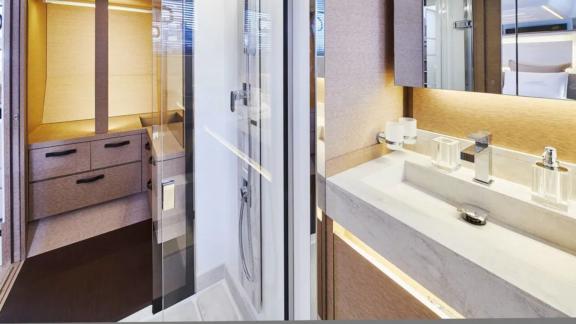 The modern bathroom and closet of the motor yacht Shaft feature modern design and functionality.