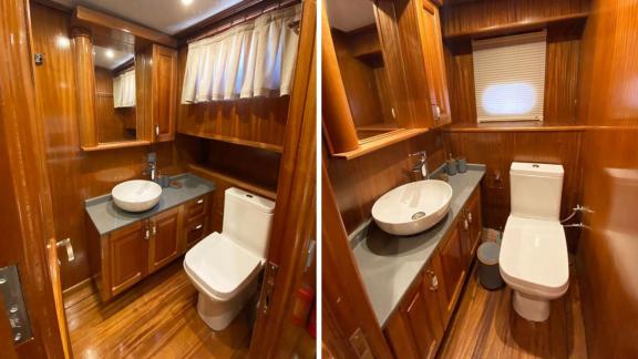 Stylish bathroom with modern amenities and wooden decor on Gulet K. Salih Ünlü.