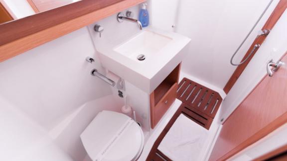 The modern bathroom on the Vita yacht features a stylish and functional design.