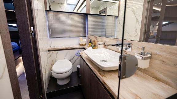 Bathroom on FG Star yacht featuring marble flooring and stylish modern fittings.