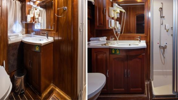 A stylishly furnished bathroom with shower and elegant wood panelling on a gulet in Croatia.