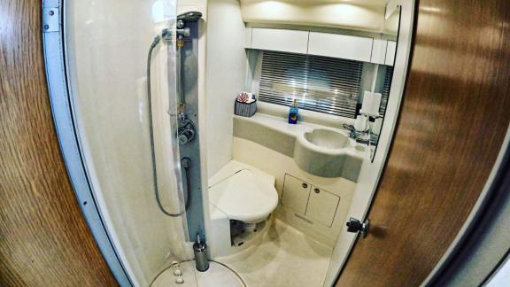 Practical guest bathroom of motor yacht Sweet Lily stands out with its stylish design.