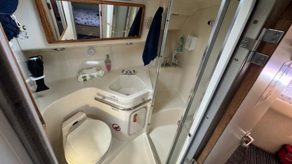 The compact guest bathroom of motor yacht Liberta is practical and functional.