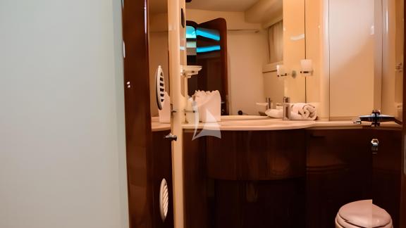 The bathroom on the Hasard yacht offers a modern and stylish design for comfortable use.