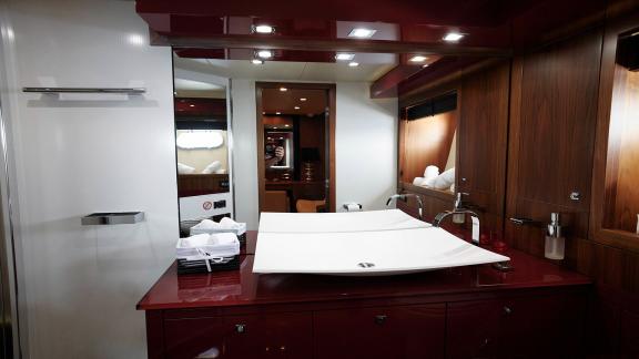 The bathroom of Um7 stands out with its modern design, spacious sink, and stylish decor.