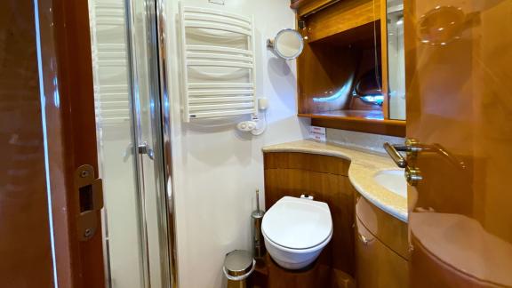 The bathroom of motor yacht Riva 21 is equipped with a modern shower cabin and stylish accessories.