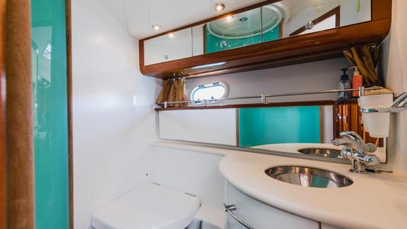 The bathroom of motor yacht Unplugged features an elegant and functional design.