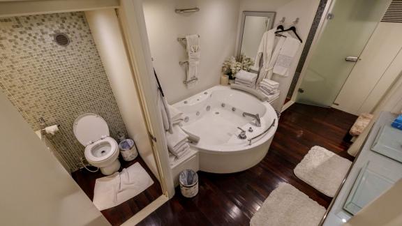 The elegant bathroom of the Tatii 2 luxury motor yacht enhances the yacht rental experience in Dubai.