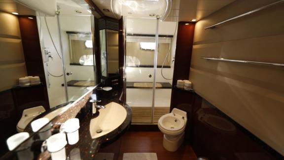 Enjoy the comfort in the stylish and modern bathroom of motor yacht Bormus 2.