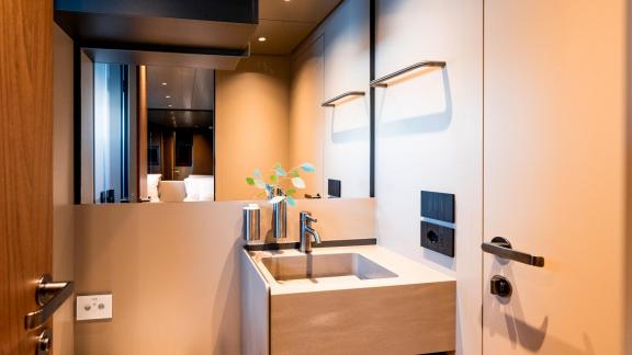 Enjoy a comfortable and stylish guest toilet aboard Kimani.