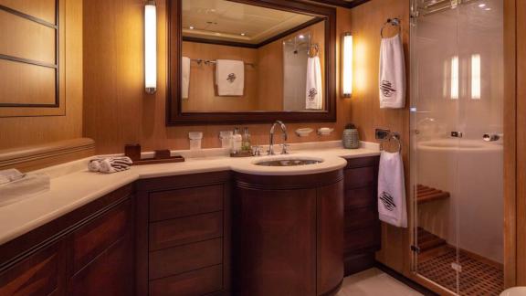Cosmos yacht features a refined bathroom with deluxe finishes and comfort details.