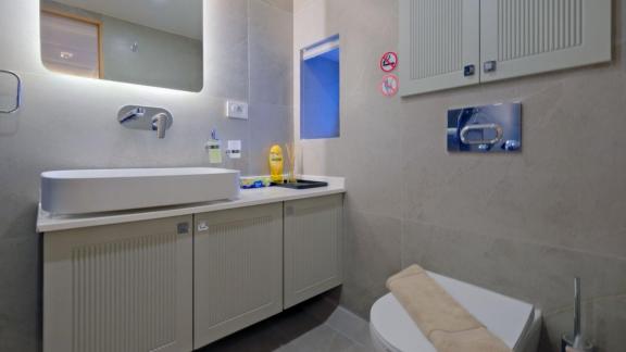 Among Fethiye luxury yacht options the 6 cabin 12 guest Dodo motorsailer features a modern bathroom with shower.