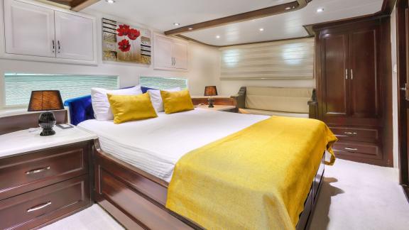 Cozy cabin with double bed and stylish decor on the Gulet Hasay.