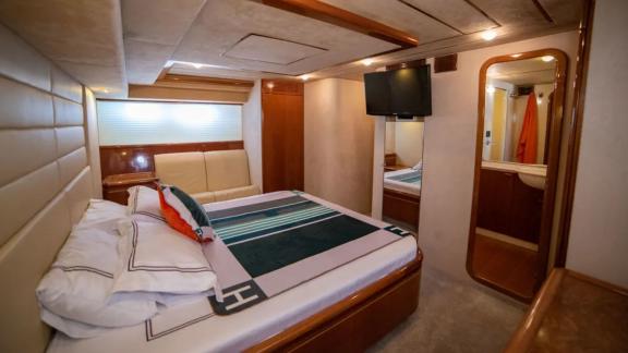 Cozy and stylish bedroom on the Hurrem motor yacht.