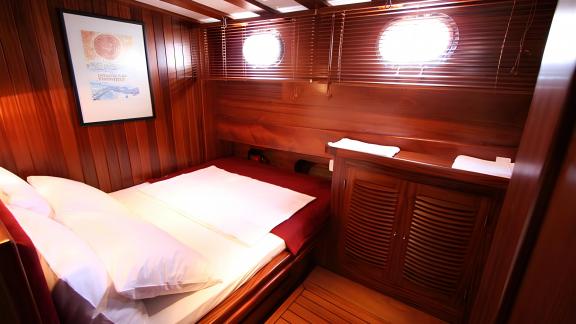 Tastefully furnished cabin on our Gulet, perfect for relaxing nights at sea.