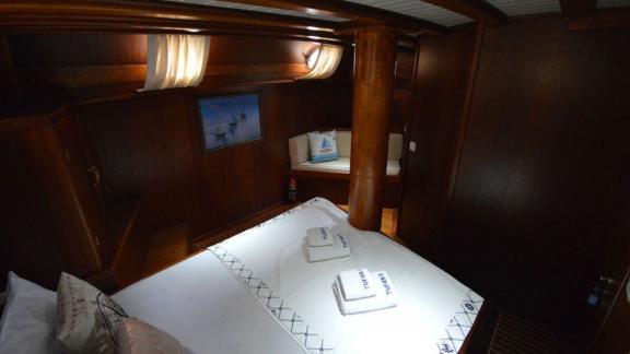 Well-equipped cabin on Gulet Tufan 5 with seating area and nautical ambiance.