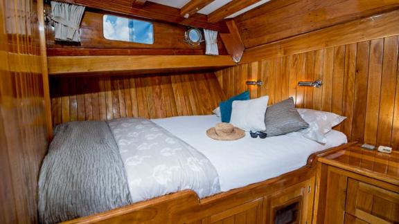 Cozy guest cabin with double bed on Gulet Nikola. Perfect for restful nights onboard.