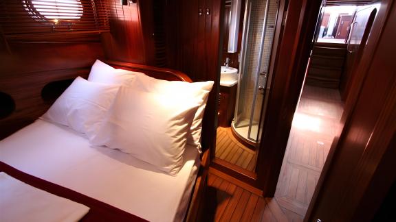 Comfortable cabin with private bathroom on our Gulet, perfect for your relaxation at sea.