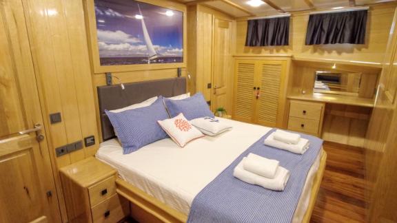 Enjoy restful nights in the spacious cabin of Gulet Su Perisi C in Bodrum.