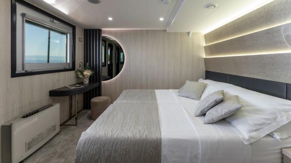 Yachtcharter: Experience tranquility and comfort in the cozy cabin of the Mega Yacht Cristal in Croatia.