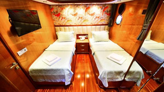 Tastefully furnished twin cabin on the Gulet Maya.