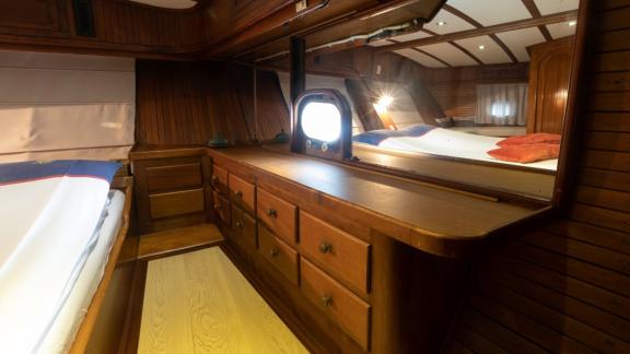 Dressing area with mirror and storage in the cabin of Yacht Kanarya.