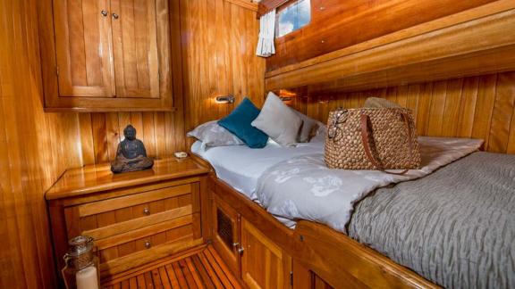 Cozy cabin with stylish wood design on Gulet Nikola. Perfect for restful nights onboard.