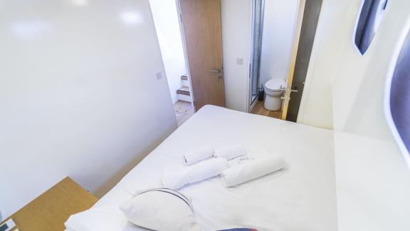 Double cabin with direct access to ensuite bathroom and comfortable amenities.