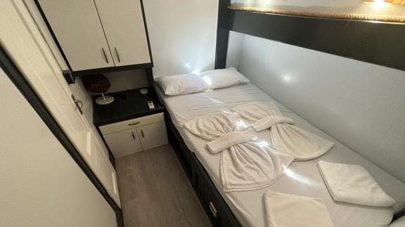 Practically furnished double cabin with closet and lighting on Gulet Aria.