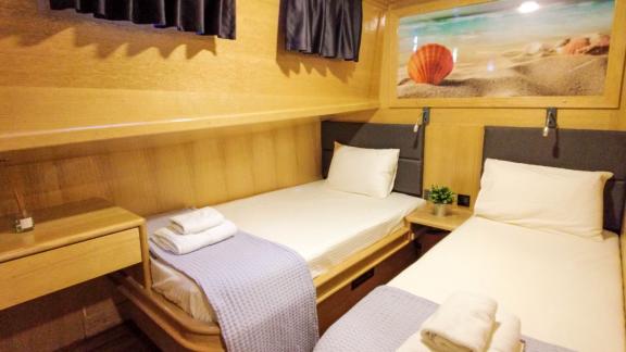 Enjoy comfort and tranquility in the twin bed cabin aboard Gulet Su Perisi C in Bodrum.