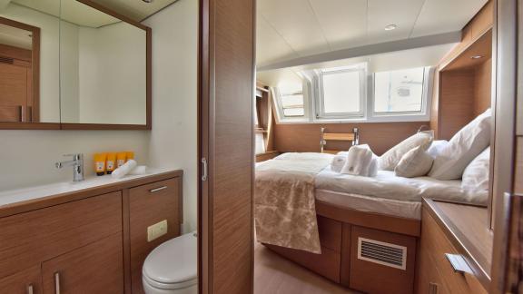 Comfortable double cabin with en-suite bathroom and stylish design on Lagoon 450F Adriatic Tiger, perfect for privacy an